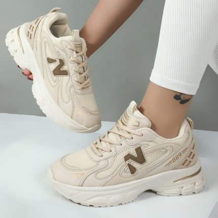 کتونی نیوبالانس اسپرت زنانه مدل 889 رنگ کرم کد 00123